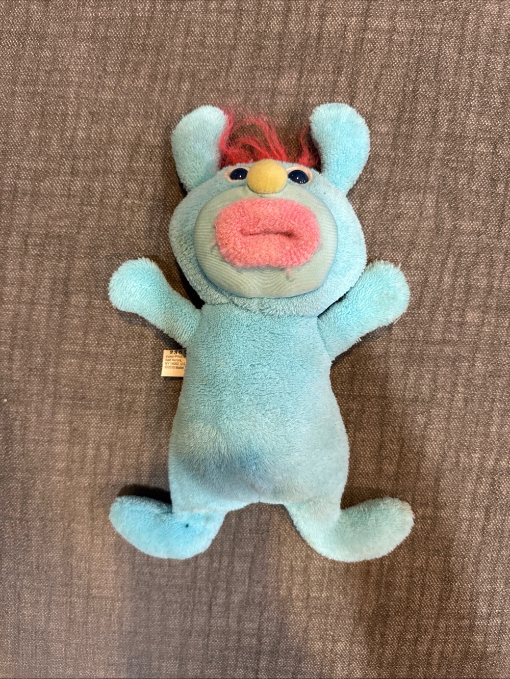 Fisher-Price Blue Plush Character with Pink Mouth